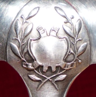 detail pf a 32 cm long ladle (silver-plated brass), issued in 1900
