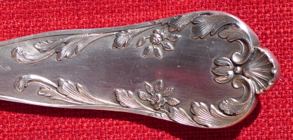 detail pf a 32 cm long ladle (silver-plated brass), issued in 1900
