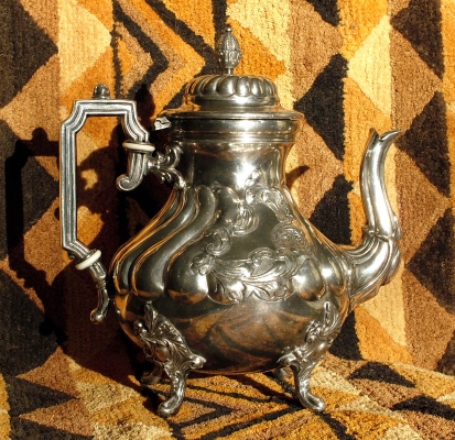A silver-plated coffee-pot) made from tin-containing Metal Parisien