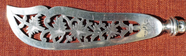 A richly decorated silver-plated fish-knife
