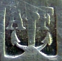 Mark for large/special pieces of cutlery manufactured using mtal blanc (brass) as a base metal for silvering: early period (before c.1890)