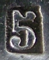 Mark for large/special pieces of cutlery manufactured using mtal blanc (brass) as a base metal for silvering: late period (c.1903 - 1913)