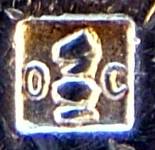 the 'knight' chess figure in a square box between two letters 'O' and 'C'