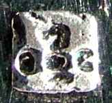 the 'knight' chess figure in a square box between two letters 'O' and 'C'
