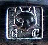 cat head (tte de chat) mark