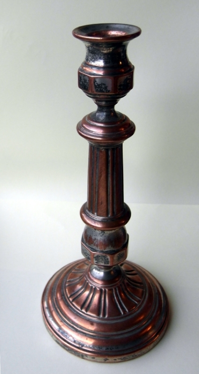 A silver-plated candlestick, made by Norblin and Co in 1848 A silver-plated candlestick, made by Norblin and Co in 1848