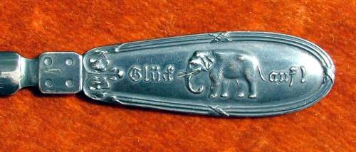 Inscriptions on the handle of Wellner silver-plated paper knife