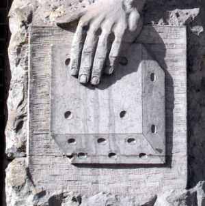 The bas-relief of the dice on the entrance of Aue Metal Goods Factory