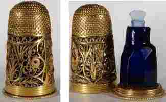 18c silver filigree thimble with blue glass bottle and seal