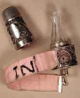 18c combination silver filigree thimble, clear glass bottle and tape measure