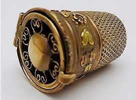 thimble said to be vinaigrette but looking more like a thimble with a recently added perforated false bottom