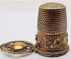 thimble said to be vinaigrette but looking more like a thimble with a recently added perforated false bottom