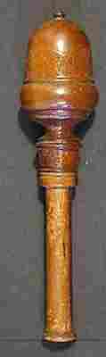A combined 19c wooden thimble and needle holder
