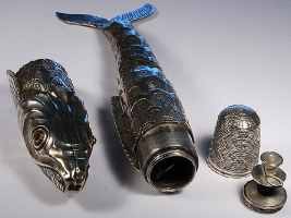 Probably German 18c fish compendium comprising a thimble, thread holder and a place for needles