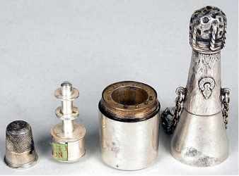 19c, silver Champagne bottle shaped combination thimble, thread holder and tape measure, and pin
holder