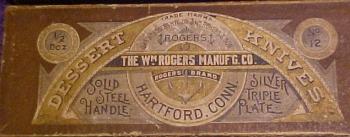 an ancient carboard case of The Wm. Rogers Manufg. Co