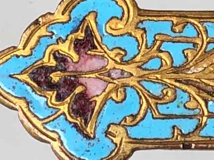 close up of champlev technique