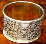 silver napkin ring: illegible master