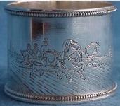 silver napkin ring: W. Kangin