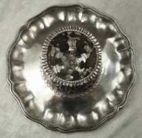silver plate of unknown origin and use