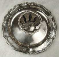 silver plate of unknown origin and use
