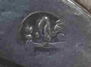silver vase of unknown origin