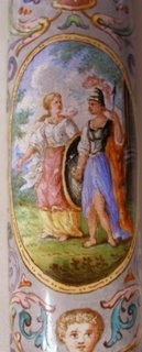 oval scenes on the handle