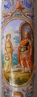 oval scenes on the handle