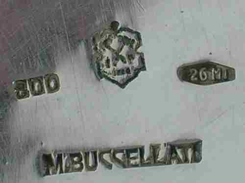 silver candlesticks retailed by Buccellati