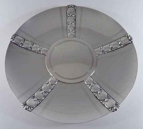 The plate repatinated and lightly polished