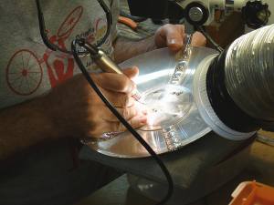flattening the over-filled sterling mounds with a special smoothing mode