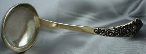 unidentified silver ladle