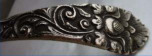 unidentified silver ladle