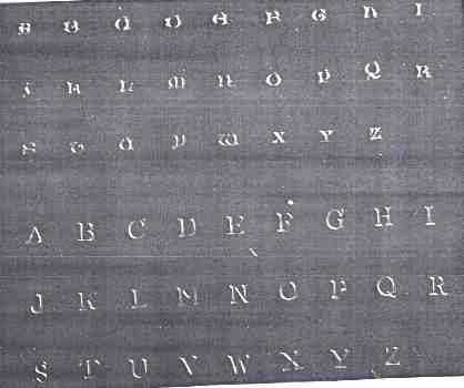 An example of the Gothic (1948-1973) on top and Roman (1974-1999) lettering