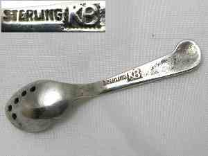 mysterlious sterling silver spoon