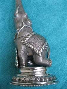 silver sprinkler shaped as an elephant