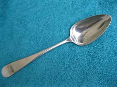 table spoon with bizarre pseudo marks