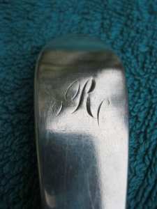 table spoon with bizarre pseudo marks