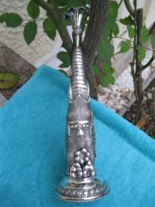 silver sprinkler shaped as an elephant