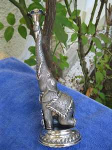 silver sprinkler shaped as an elephant