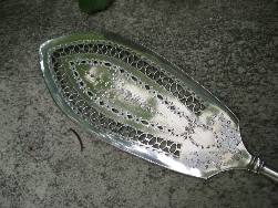 silver fish slice or unknown origin
