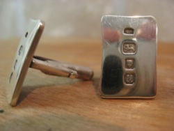 silver cufflinks, London 1994: original on the right, reproduction on the left