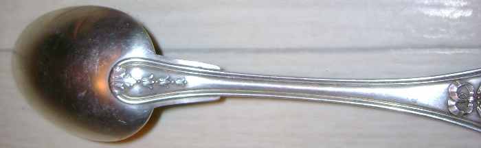silver fork with seven French marks