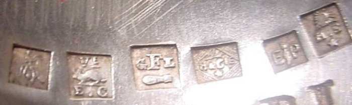 silver fork with seven French marks