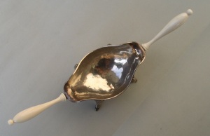 silver devil on 18th century Spanish brazier