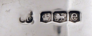 hallmarks on the upper back of the Selfridge Trophy, won in 1924 by distaff bronc rider Bonnie McCarroll