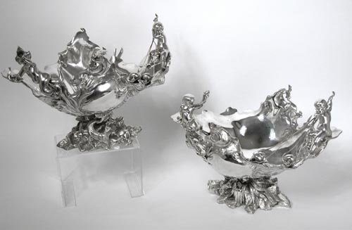pair of Centrepieces by Wolfers Frres: Aux Maraudeurs--'Puti playing with snails'