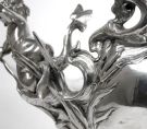 detail of pair of Centrepieces by Wolfers Frres: Aux Maraudeurs--'Puti playing with snails'