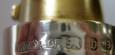 Sponsors mark and hallmarks on the neck of the flask