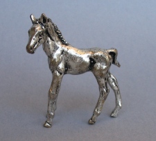 a collection of silver animals
